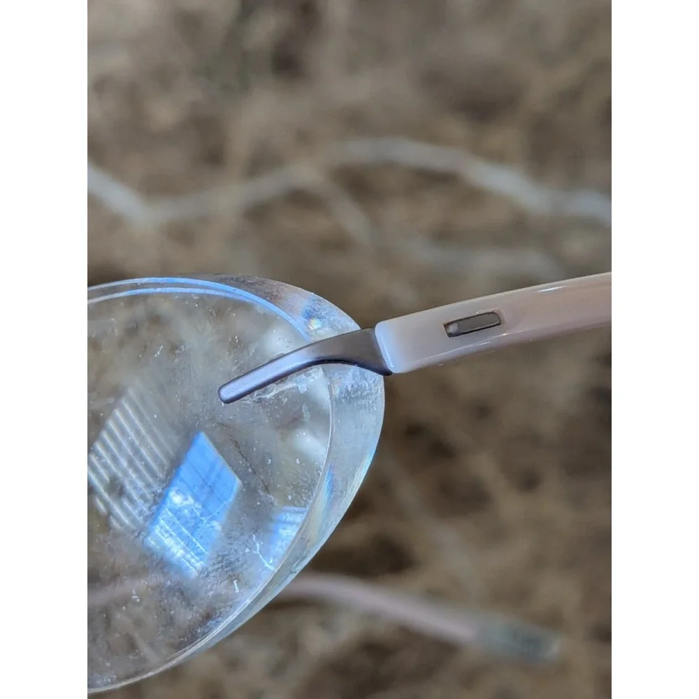 Silhouette Eyeglasses 4476 40 6053 52[]17 135 5416 Titan Creme Rimless Austria